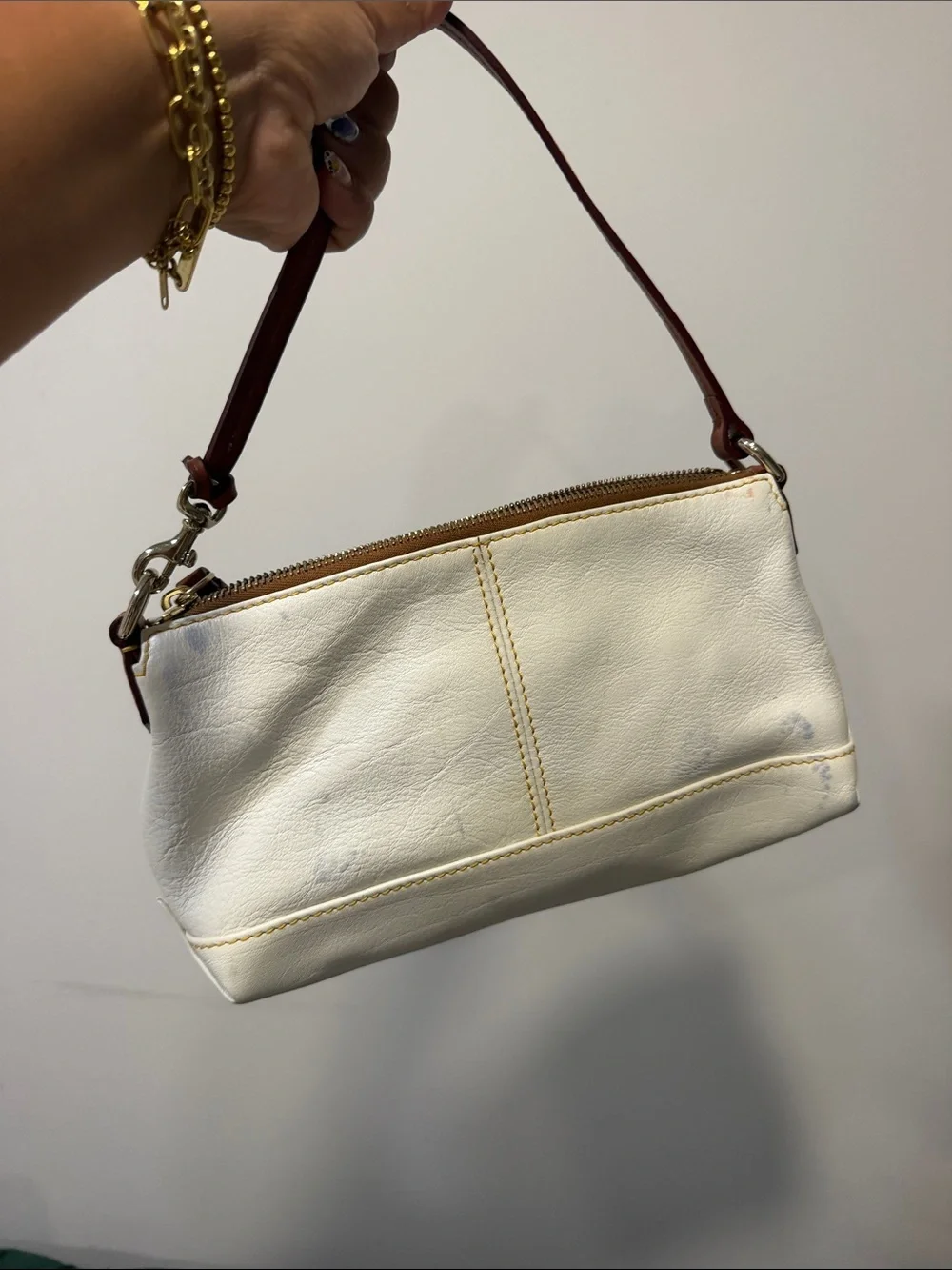 Dooney & Bourke Cream Leather Wristlet with Brown Trim - Sleek Everyday Clutch